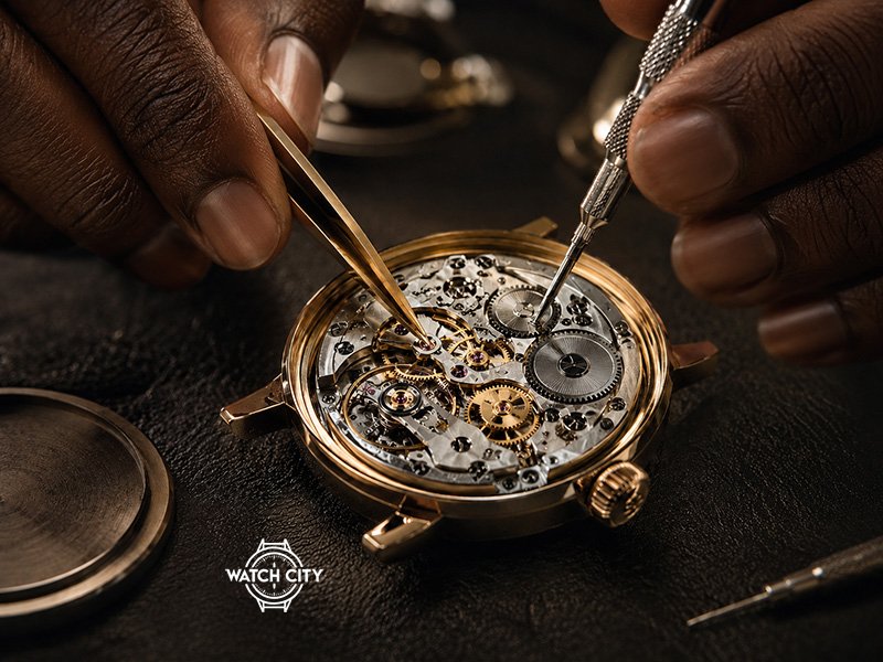 Watch technician performing a repair